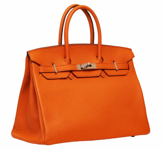 From Vision to Vogue: The Fascinating History of Emerald Empire Handbags