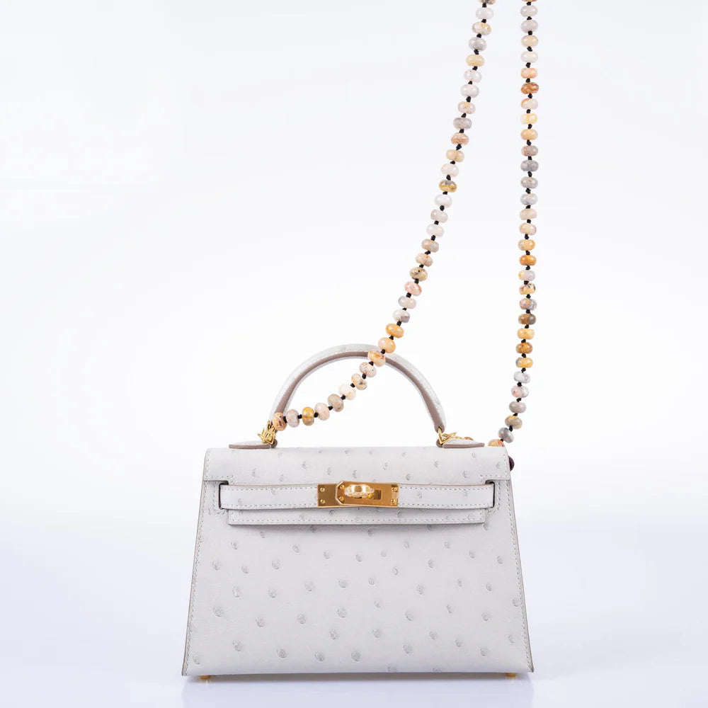 HERMÈS KELLY 20 MINI II SELLIER GRIS PERLE OSTRICH WITH GOLD HARDWARE