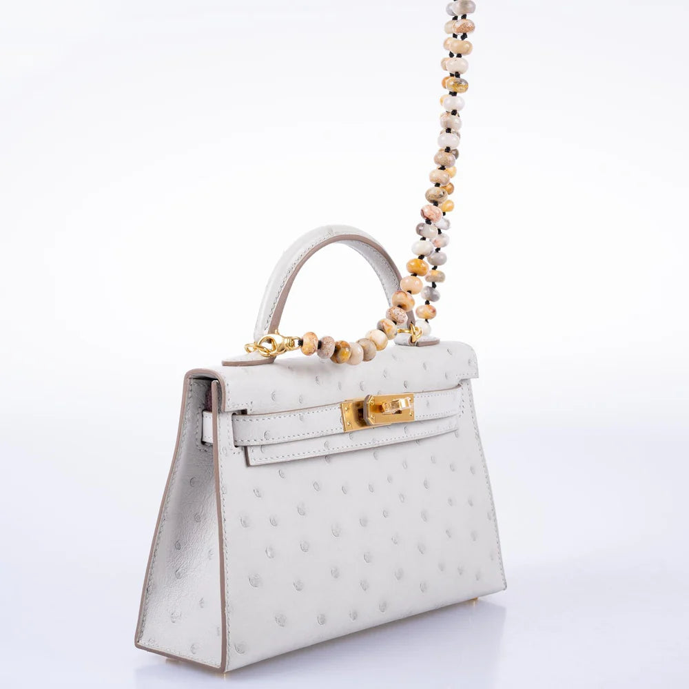 HERMÈS KELLY 20 MINI II SELLIER GRIS PERLE OSTRICH WITH GOLD HARDWARE