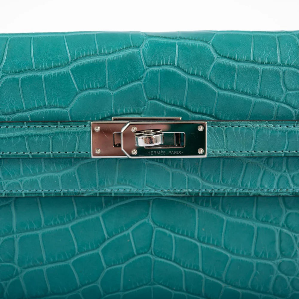 HERMÈS KELLY LONGUE WALLET BLUE PAON MATTE ALLIGATOR WITH PALLADIUM HARDWARE